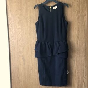 Michael Kors black dress with gold zipper. Size 2.